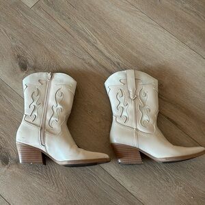 Cowboy boots cowgirl boots. Worn once to Zach Bryan. Normal scuff marks.